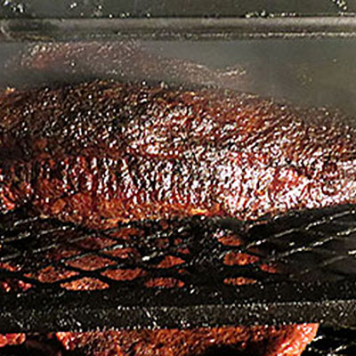 Briskets in Smoker | LOVE AND SMOKE BARBECUE