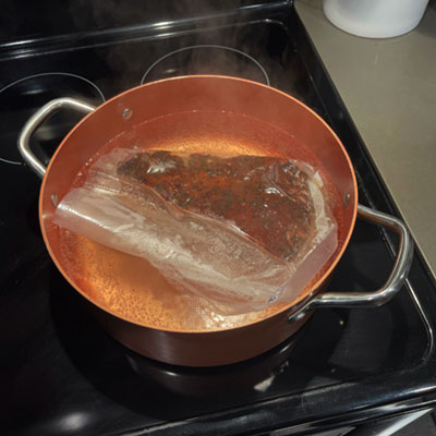 Vac-Seal Bag in Pot | LOVE AND SMOKE BARBECUE